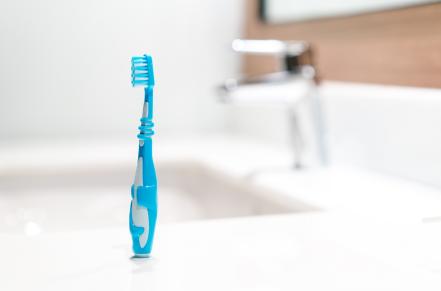 toothbrush drying next to sink