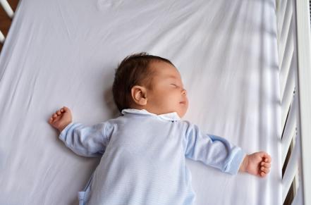 baby sleeping in crib