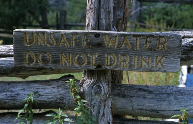 Sign that says Unsafe Water: Do Not Drink