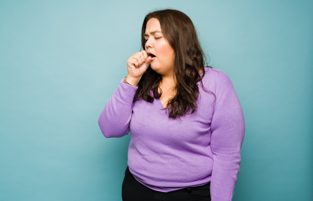 Woman coughing