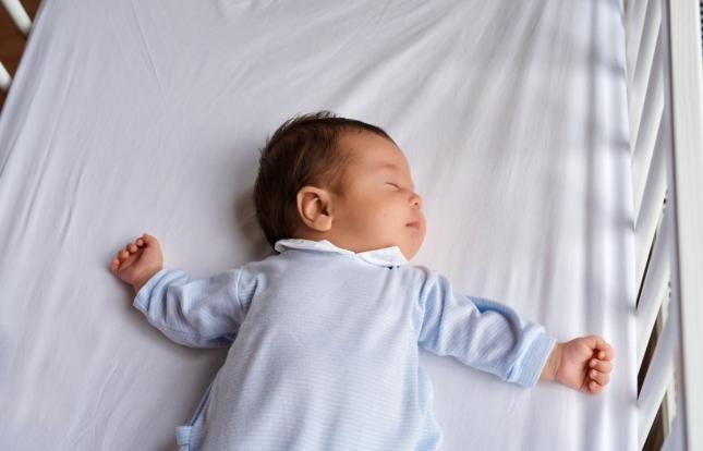 baby sleeping in crib